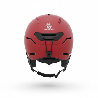 A matte red ski helmet with black chin strap and vents, featuring the 'armadillo' brand logo on the front, shown against a plain white background.